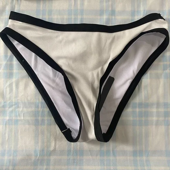 Celine's Classic Black And White Bikini Top Is A Bandeau-Style Halter Top. - Picture 3 of 7